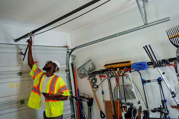 Professional Garage Door Panel Replacement technician working in Hyde Park, PA